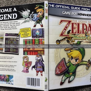 May include: The Legend of Zelda: The Minish Cap official player's guide for Game Boy Advance. The cover features Link with a sword and shield, and the text "BECOME A LEGEND". The guide includes maps and gameplay strategies.
