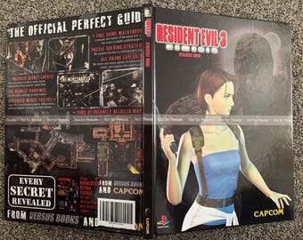 May include: A Resident Evil 3: Nemesis strategy guide. The cover features a woman in a blue top holding a gun, with the game's title in red and white. The back cover has game screenshots and text.