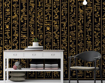 Papel pintado de jeroglíficos egipcios: mural de texto antiguo dorado sobre negro