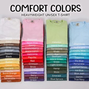 a collection of various colored t-shirts, each with a different color name, arranged in two rows.