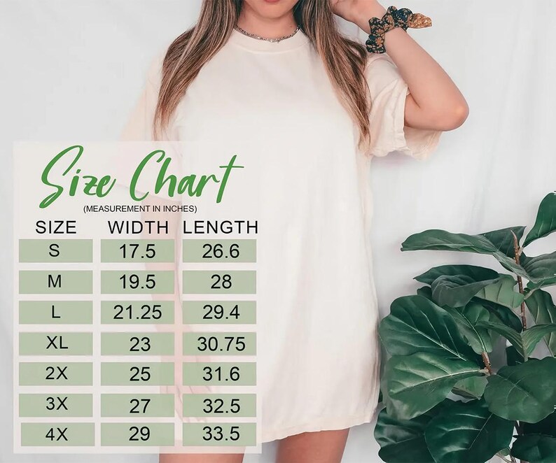 a woman wearing a white dress, standing next to a potted plant. There is a size chart displayed in front of her, providing measurements for different dress sizes.
