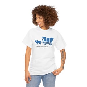 May include: White t-shirt featuring a blue pixelated graphic of a wagon pulled by an ox, with the text "You have died from split squats" below. The shirt is made of a soft, comfortable material.