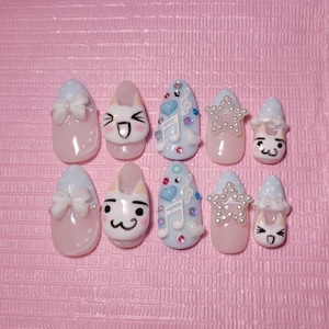 toro inoue y2k blue and white press on nails