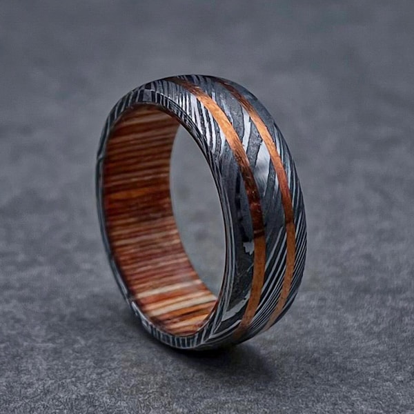 Damascus Steel Ring with Whiskey Barrel Wood Sleeve and Two Copper Inlays, Anniversary Gift