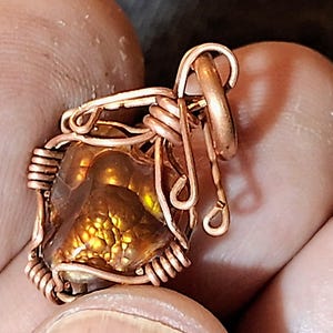Amulet, Copper pendant with fire agate from Deer Creek, Arizona. Copper jewelry for protection.