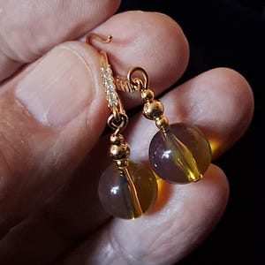 14k gold-filled and blue amber earrings with zircons.