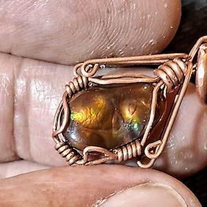 Copper pendant with fire agate from Deer Creek, Arizona. Copper jewelry for protection.