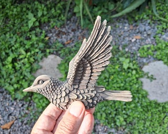 Vogel aus Palo-Santo-Holz geschnitzt