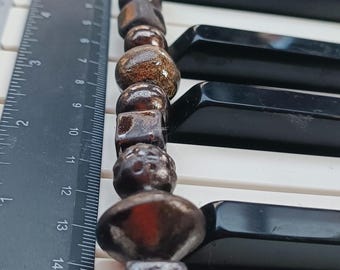 Unique Handmade   ceramic beads mixed colors 15 pcs           Each piece is filled with love and care, shaped by decades of experience.
