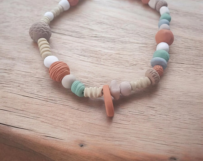Unique Handmade  terracotta ceramic beads  34 pcs