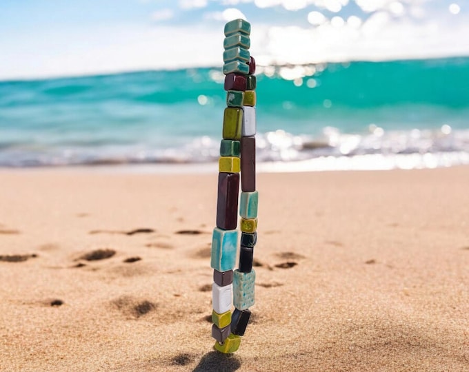 Unique Handmade   ceramic beads mixed colors 24 pcs           Each piece is filled with love and care, shaped by decades of experience.