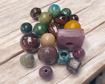 Unique Handmade   ceramic beads mixed colors 19 pcs           Each piece is filled with love and care, shaped by decades of experience.