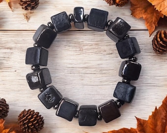 Handmade, flexible ceramic bracelet made of small cube-shaped beads 13 pcs