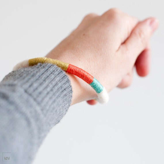 Items similar to Felt wrap bracelet combined with twisted threads