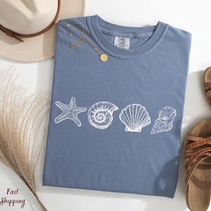 Camiseta de conchas marinas de los 90 con estilo vintage de Comfort Colors®, camiseta retro Y2K con conchas marinas, camiseta para amantes del mar, camisetas de verano con océano, camiseta con animales marinos adorables