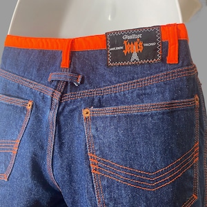 Vaqueros Jean Paul Gaultier de los años 90, diseño francés, jpg, denim teñido con ribete naranja