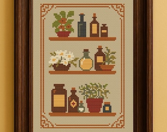 May include: Cross-stitch artwork in a dark brown frame. The image shows three shelves with bottles, jars, and potted plants. The color scheme includes browns, greens, and yellows. The artwork is a still life.