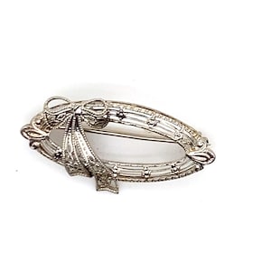 Vintage White Gold Victorian Circle Brooch with Filigree and a Dainty Ribbon