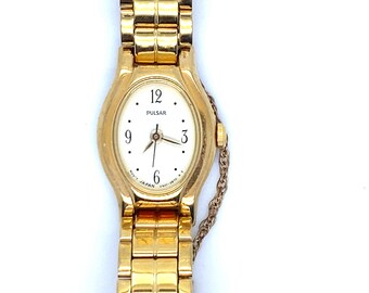 Vintage Gold Women's Wrist Watch Pulsar with Metal Band and Safety Chain