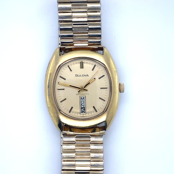 BULOVA アナログ腕時計 シルバー/ゴールド Vintage Men's Gold Toned Bulova Automatic Wrist Watch With