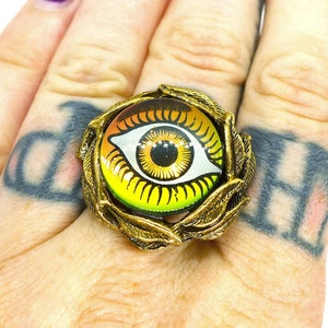 Holographic eye ring hotsell