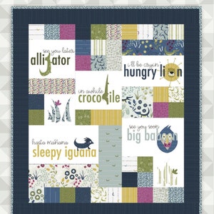 May include: A quilt pattern with a patchwork design featuring various animal illustrations and text. The quilt is made up of squares with different colors and patterns. The text includes "see you later alligator", "in awhile crocodile", "ill be coyin' hungry lion", "hasta mañana sleepy iguana", and "see you soon big baboon". The quilt is surrounded by a dark blue border. The text "GOODBYE mini by meags & me" is displayed below the quilt.