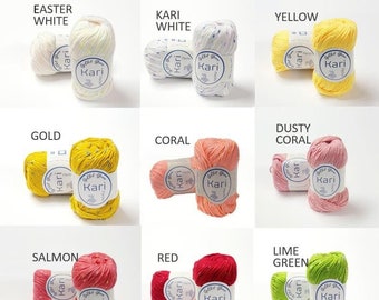 May include: A collection of 12 balls of yarn in various colors, including yellow, red, green, blue, and white. Each ball has a white label with the text "Kari" printed on it.