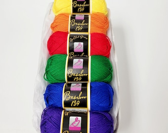 May include: Six skeins of yarn in a rainbow of colors, yellow, orange, red, green, blue, and purple. Each skein is labeled "Bamboo 139" with a pink crochet hook logo.