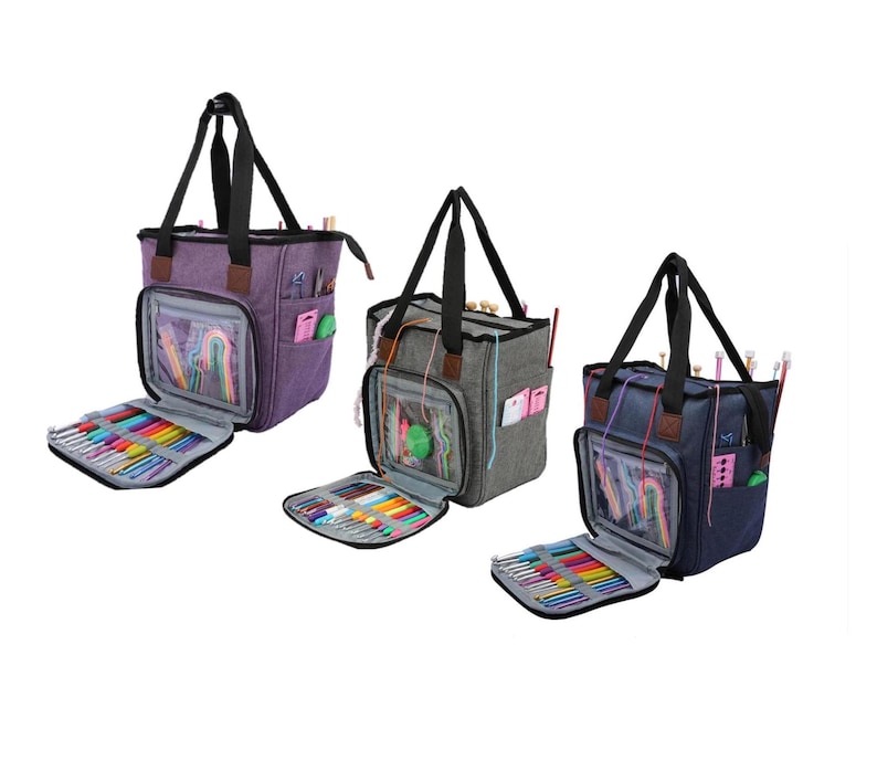 May include: Three different colored knitting bags with multiple compartments and pockets. The bags are open and show the interior compartments filled with knitting needles and crochet hooks.