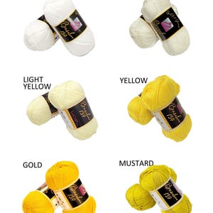 Puede incluir: Seis ovillos de hilo en varios tonos de amarillo y blanco. El hilo est&aacute; etiquetado como "Bamber 139" y est&aacute; dispuesto en pares. Los colores son blanco, perla, amarillo claro, amarillo, dorado y mostaza.