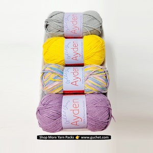 May include: Four balls of yarn in different colors: gray, yellow, multi-colored, and purple. Each ball has a label that says "Culhet Yarns Ayden 100% Premium Acrylic".
