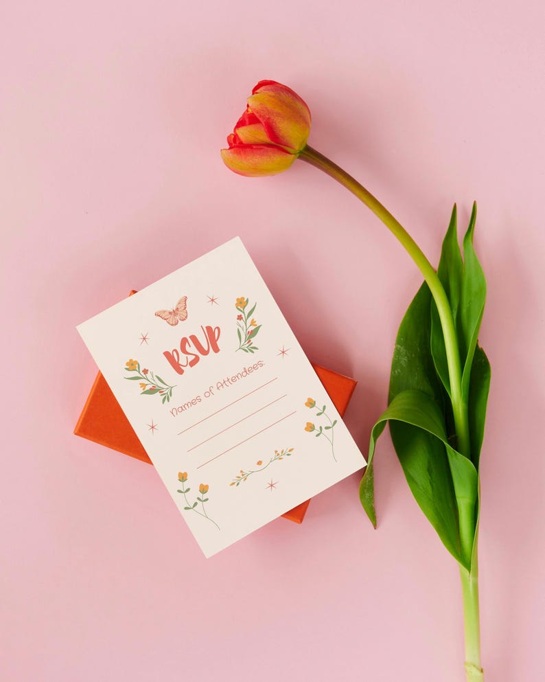 Spring Bloom Bar invitation with pastel florals and butterfly design. Perfect for printable brunch party invites or bouquet-making events. Styled on a pink background with an orange gift box and greenery.