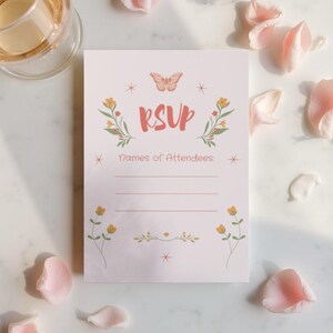 Printable RSVP card for Bloom Bar invitation set. Light pink floral RSVP with butterfly and wildflower details, photographed on marble with soft petals for a dreamy, spring aesthetic.