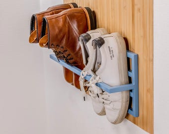 壁掛け式シューズラック – 玄関に最適なミニマリストな金属製シューズオーガナイザー。小さなスペースでも靴を収納できます。