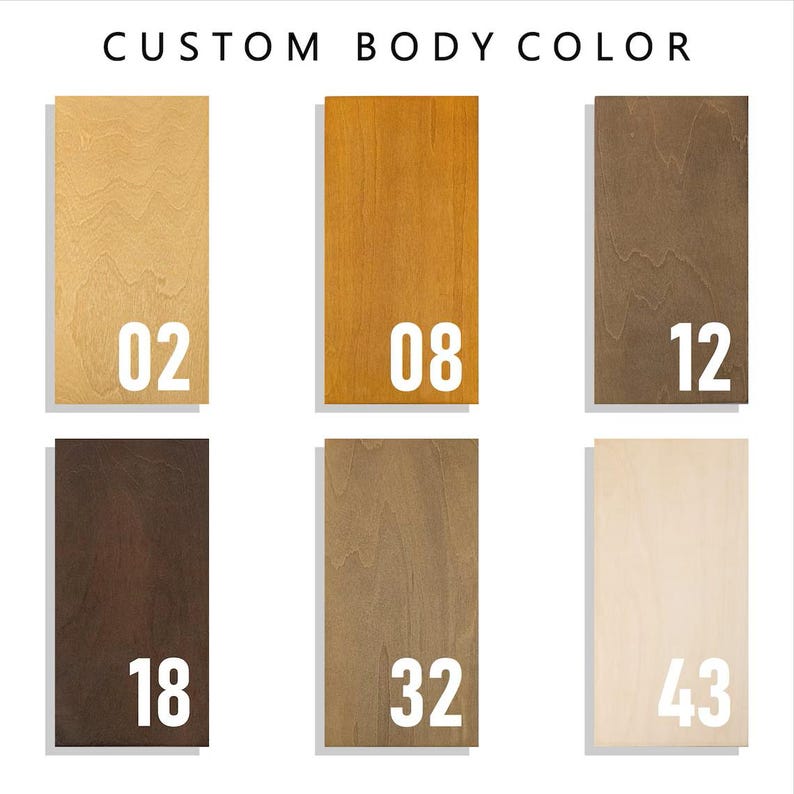 May include: A color chart titled CUSTOM BODY COLOR featuring six rectangular wood swatches with visible grain. The swatches are labeled with white numbers: 02, 08, 12, 18, 32, and 43, representing various shades of light, medium, and dark brown wood tones.