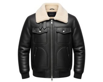 May include: Black leather jacket with a cream-colored shearling collar. The jacket features a zip-up front, two chest pockets, and two lower pockets. The cuffs and waistband are ribbed.