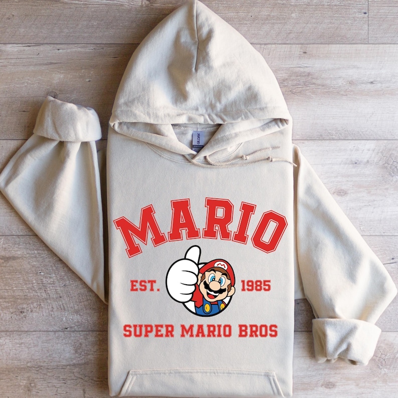 Super Mario Hoodie, Disney Mario Character, Disneyland Trip Sweatshirt, Mario Hoodie, Disneyland Hoodie, Disney Birthday Gift, Super Mario Bild 1