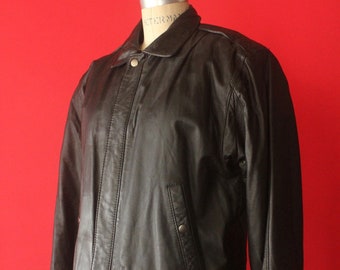 Vintage 80's Men's Black Leather Jacket by What We Wear, size 38