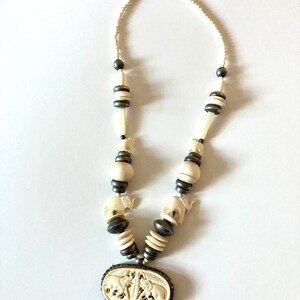 Vintage 80’s Bohemian Carved Bone Beaded Elephant Pendant Necklace