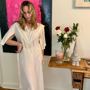 cream silk dress vintage Bias cut cream silk satin wedding gown with white floral lace bodice. Covered buttons and self belt, made in Europe in the early part of the 1930s. In store and online now. #