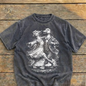 Könnte beinhalten: Ein Set aus drei Keramikbechern mit gesprenkelter, matter Oberfläche. Die Becher sind in Creme-, Hellgrau- und Dunkelgrautönen gehalten. Jeder Becher hat ein schlichtes, minimalistisches Design.