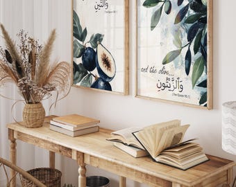 May include: Two framed prints with watercolor illustrations of figs and olives. The prints feature Arabic calligraphy and the text "By the fig" and "and the olive..." with the Quran reference in parentheses below each.