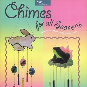 May include: A book cover with the title "Chimes for all Seasons" and a colorful illustration of a rabbit and a frog. The book is by Linda Russell Whitcomb and is published by CKE publications.