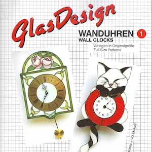 May include: A book cover with the title "Glas Design" and the text "Wanduhren 1 Wall Clocks" in red and black lettering. The cover features two stained glass clock designs, one with a floral motif and the other with a cat design. The book includes full-size patterns for making the clocks.