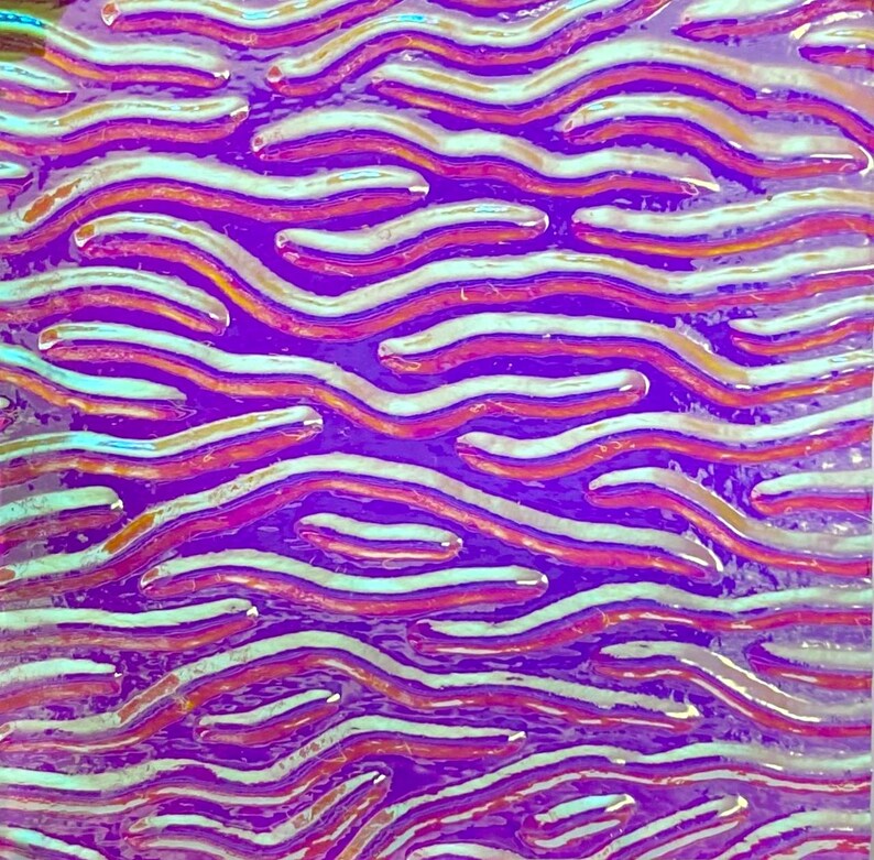May include: Abstract artwork with a repeating wavy pattern. The design features layers of purple, white, orange, and teal colors. The artwork has a glossy finish and a textured appearance.