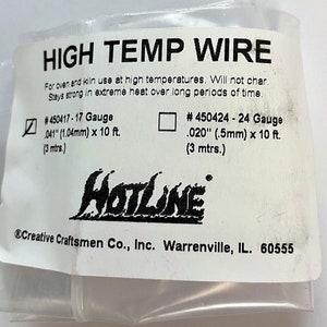 May include: White packaging with black text for high temperature wire. The text reads "HIGH TEMP WIRE" and includes information about the wire gauge, size, and length. The text also reads "For oven and kiln use at high temperatures. Will not char. Stays strong in extreme heat over long periods of time." The packaging also includes the text "HOTLINE" and "@Creative Craftsmen Co., Inc. Warrenville, IL. 60555".