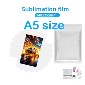 May include: A stack of A5 size sublimation film sheets measuring 148x255mm, featuring a printed graphic of an orange sports car with motion blur effects. The set includes a sealed plastic pouch and a small machine for heat transfer applications.