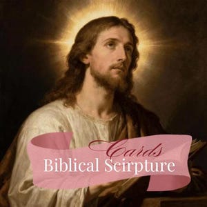 May include: An artistic depiction of a man with long brown hair and a beard, wearing a white robe. A golden halo surrounds his head. A pink banner across the bottom reads "Cards Biblical Scripture".