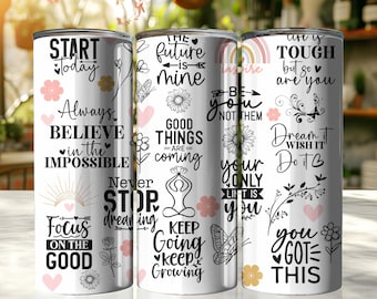 May include: Three white stainless steel tumblers with inspirational quotes and floral designs. The tumblers feature phrases like "Start Today," "Believe in the Impossible," and "You Got This." The design includes pink hearts and flowers.