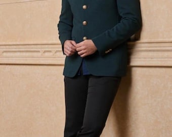May include: A dark green blazer with gold buttons and black pants. The blazer has a mandarin collar and long sleeves. The text "KING MEN'S TAILOR" is visible at the bottom of the image. The outfit is formal.